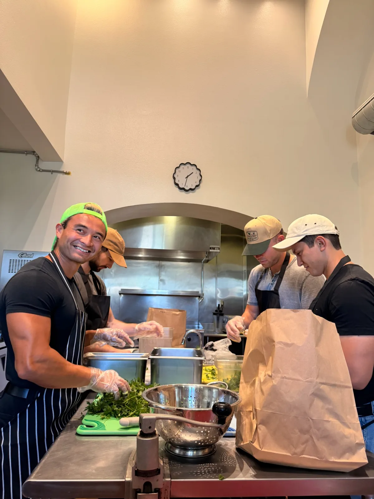 Volunteers prepping meals in the kitchen
